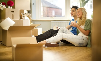 Young Couple Moving into a New Home